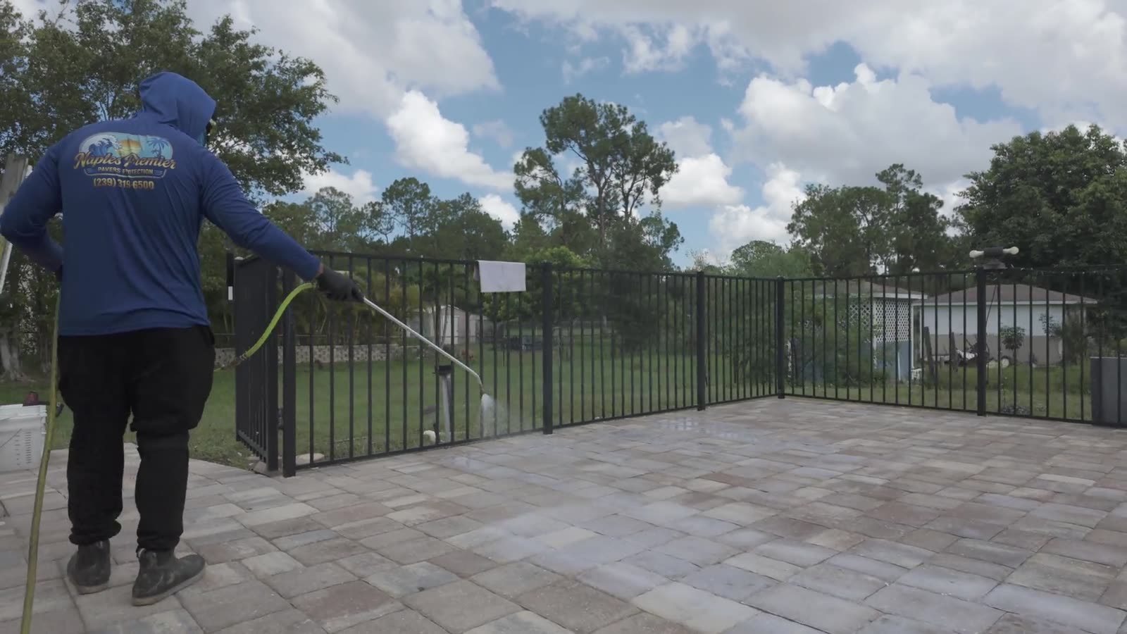 Sealer going down over a clean, re-sanded pool deck in Naples